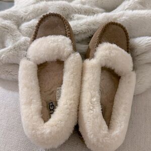 Ugg slippers. New. Never worn.